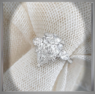 4.70 Carat Three Stone Pear Shaped Diamond Engagement Ring With Pear Diamond side Diamonds  By Chelsea Leigh and Company