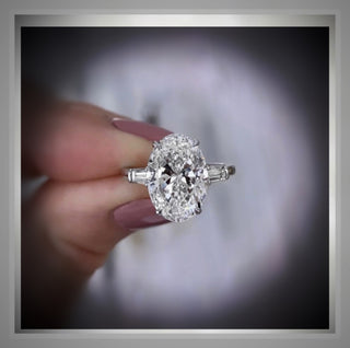 On Sale ***3.30 Carat Brilliant Cut Oval  Diamond Ring W/ Baguettes  **By Chelsea Leigh and Company