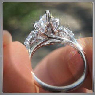 4.70 Carat Three Stone Pear Shaped Diamond Engagement Ring With Pear Diamond side Diamonds  By Chelsea Leigh and Company
