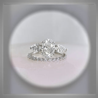 3.30 Carat Three Stone Oval Diamond Engagement Ring With Pear Diamond side Diamonds *** By Chelsea Leigh and Company