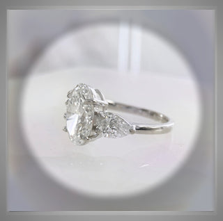 1.70 Carat Three Stone Oval Diamond Engagement Ring With Pear Diamond side Diamonds   VS1 E *** By Chelsea Leigh and Company